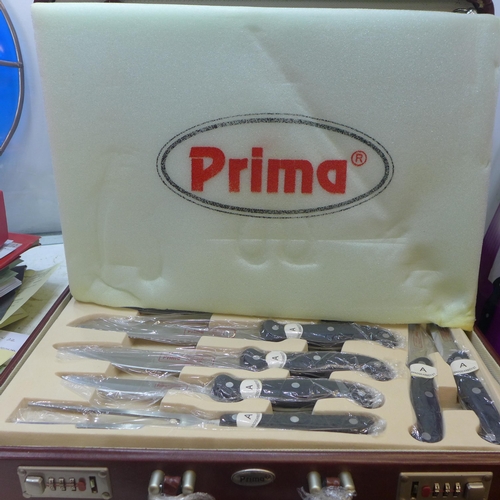 2243 - Complete set of Prima knives, forks and other utensils in case