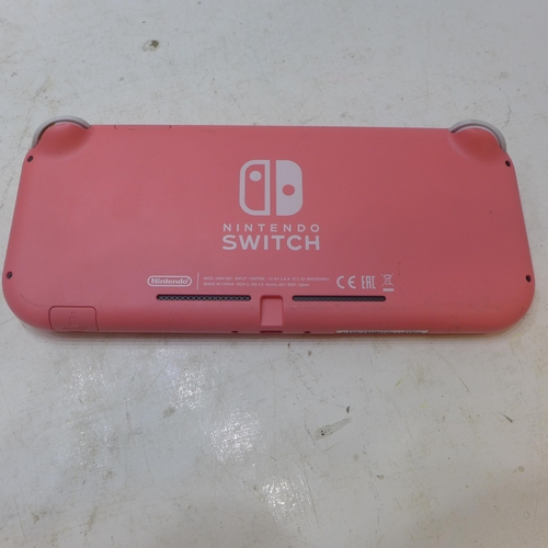 2257 - Nintendo Switch in light coral pink with charger and 2 games - W