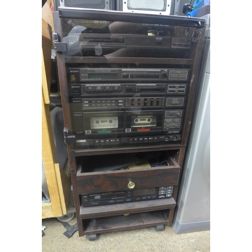 2311 - Sony stacking hi-fi in cabinet with speakers