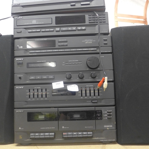 2321 - A Sony stacking hifi system with a pair of speakers