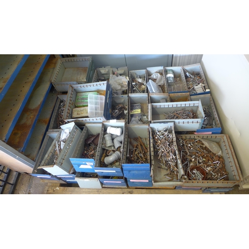 2405 - A metal storage cabinet with selection of screws, nuts and bolts, handles, approx 30 trays