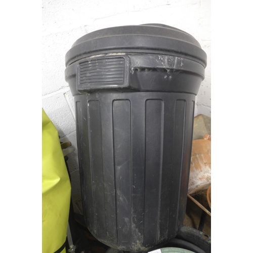 2434 - Qty. of large plastic planters, approx. 10 smaller plastic planters & black rubbish bin with lid