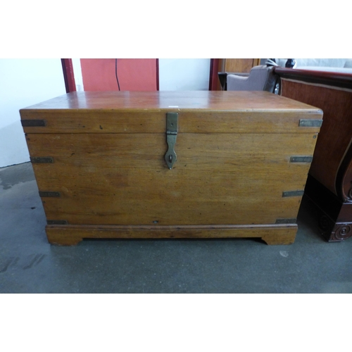 141 - A 19th Century teak and brass mounted ship's chest