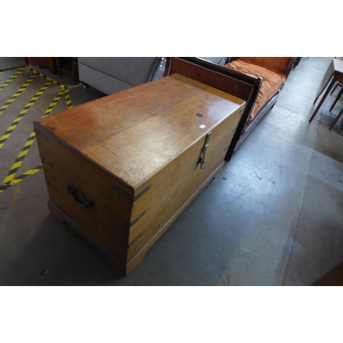 141 - A 19th Century teak and brass mounted ship's chest