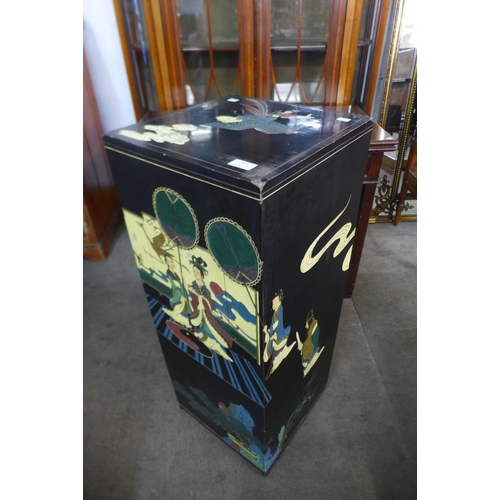 202 - A Chinese black lacquered chinoiserie pedestal