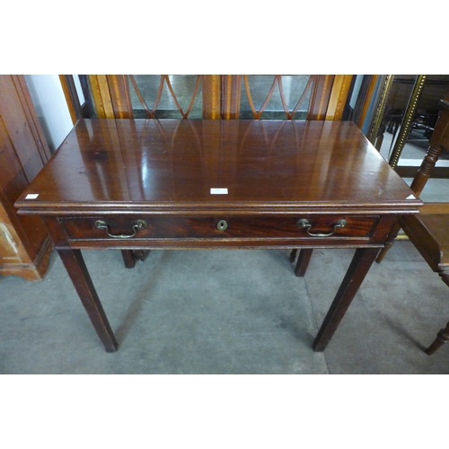 205 - A George II mahogany single drawer fold over tea table