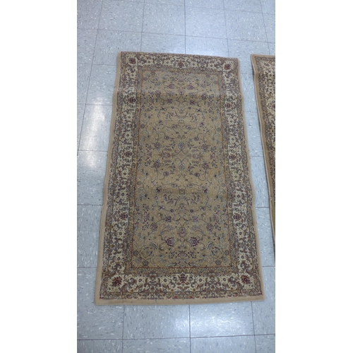 225 - Three assorted rugs