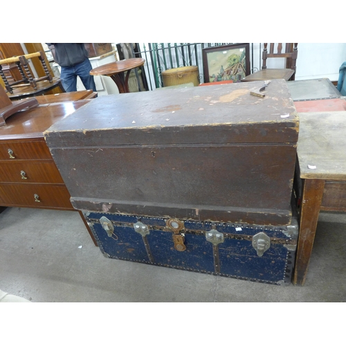 246 - Two vintage steamer trunks and a desk