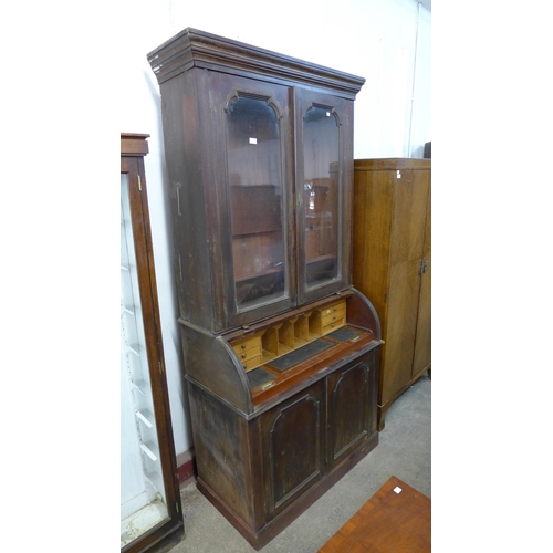 259 - A Victorian mahogany cylinder secretaire bookcase