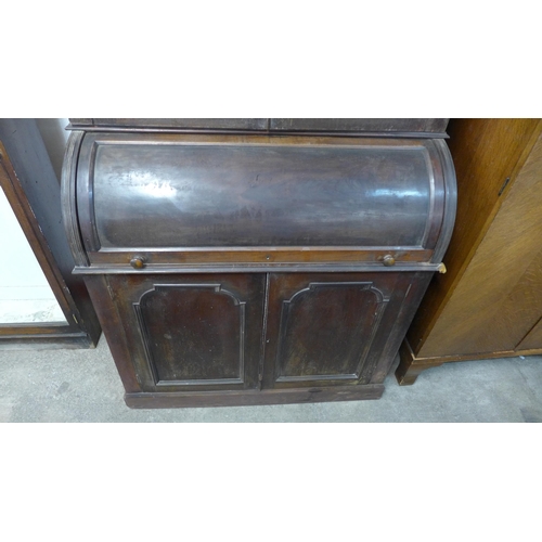 259 - A Victorian mahogany cylinder secretaire bookcase