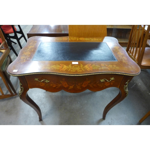 26 - A 19th Century French floral marquetry inlaid mahogany and gilt metal mounted lady's writing table