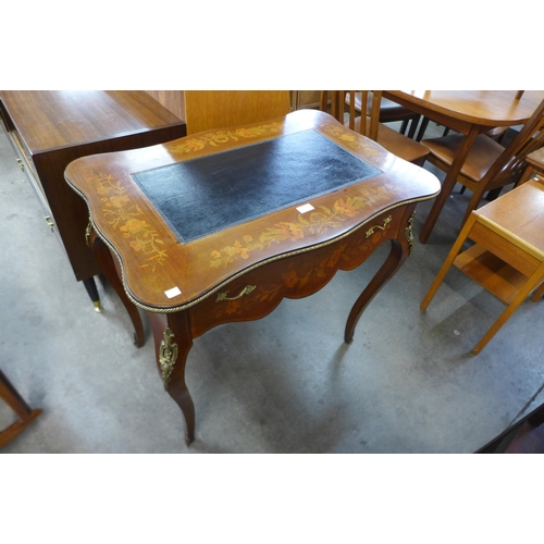 26 - A 19th Century French floral marquetry inlaid mahogany and gilt metal mounted lady's writing table