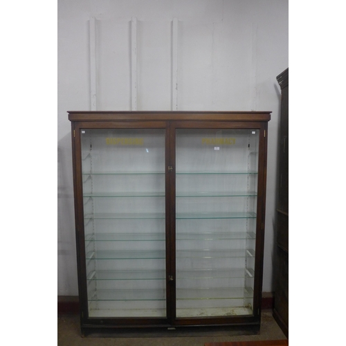 260 - A Victorian glazed mahogany pharmacist's dispensing shop cabinet