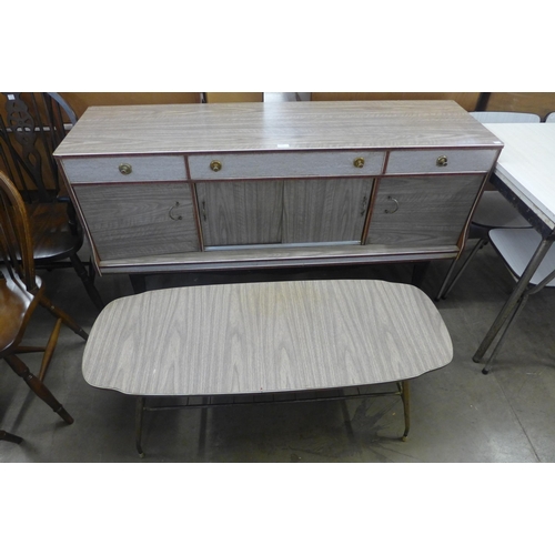 275 - A Formica kitchen table, four chairs, a sideboard and a coffee table