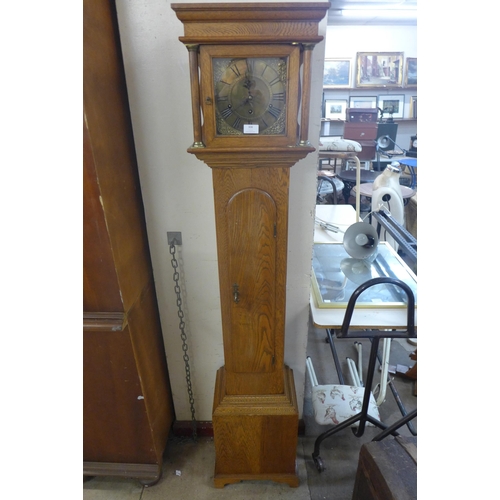 308 - An oak dwarf longcase clock