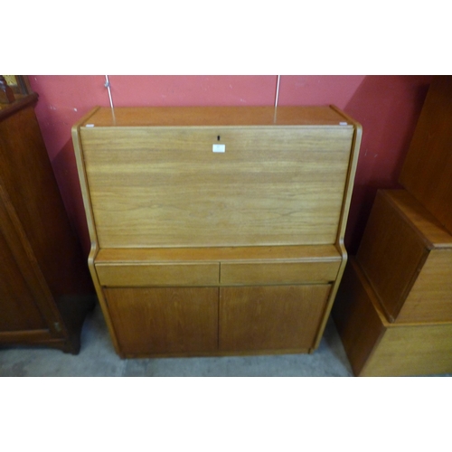 69 - A teak bureau