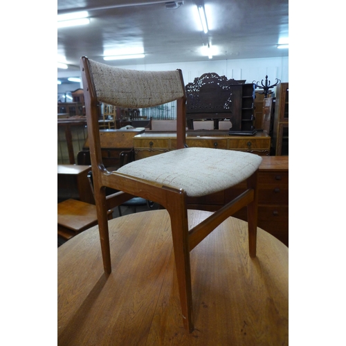 81 - A set of four Danish Erik Buch teak dining chairs