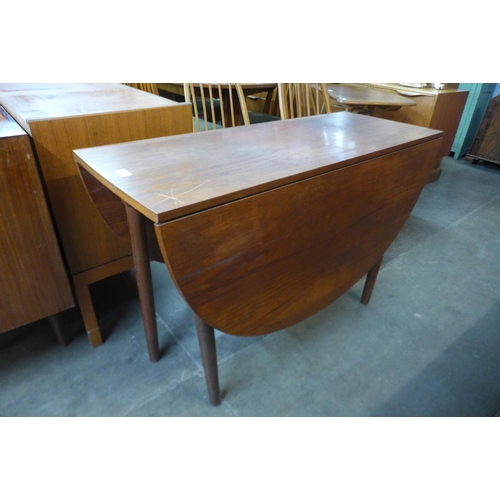 84 - A G-Plan teak drop-leaf table