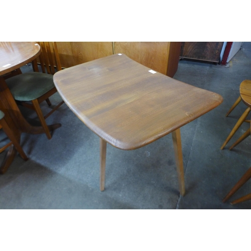 86 - An Ercol Blonde elm and beech side table