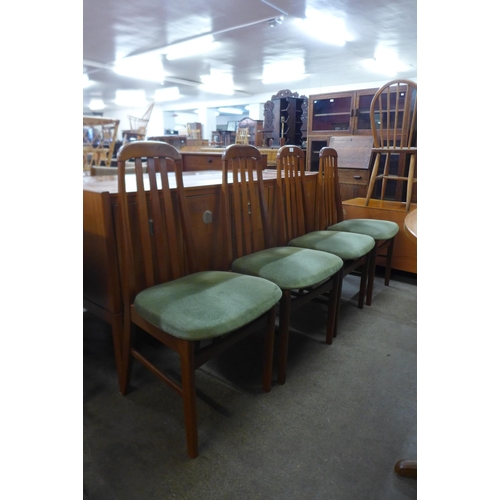 89 - A set of four teak dining chairs