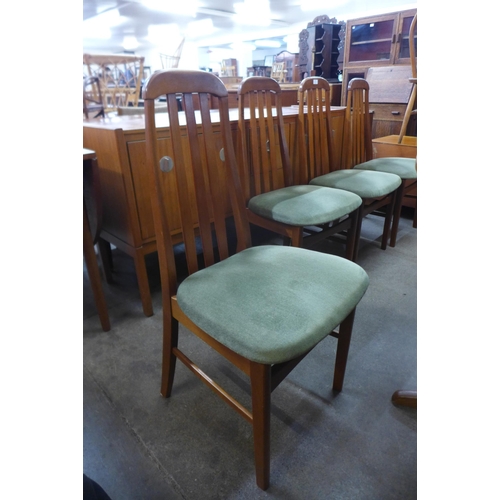 89 - A set of four teak dining chairs