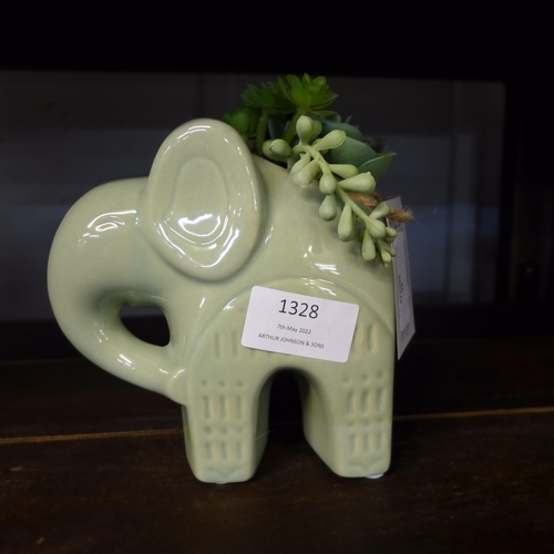 1328 - An artificial succulent plant in a ceramic elephant, H 17cms (67689706)   #