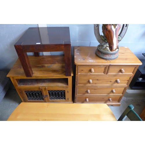 1638 - A hardwood TV unit, side table and a pine two over three chest of drawers