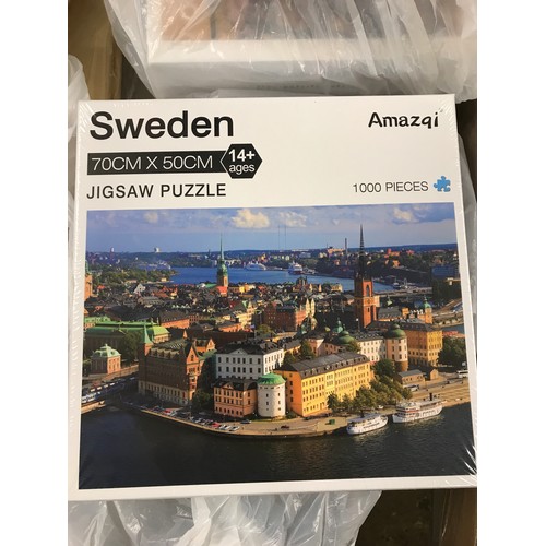 2077 - Three 1000 piece jigsaws: German Stone Castle, Positano in Italy and Stockholm Coastal Scene, sealed