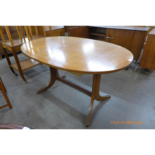 72 - A Nathan teak extending dining table