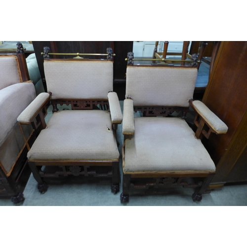 175 - A Victorian Aesthetic Movement mahogany three piece suite