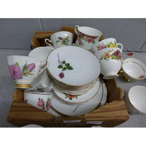 1009 - A collection of floral design china including tea cups and saucers, makers include Stanley and Winte... 