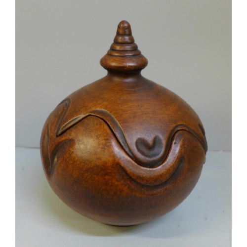 668 - A J. Ortega studio pottery pot with lid