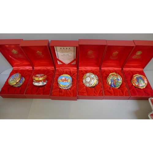 674 - Six Halcyon Days Enamels Christmas trinket boxes, boxed, and a Villeroy & Boch Toy's Fantasy Christm... 