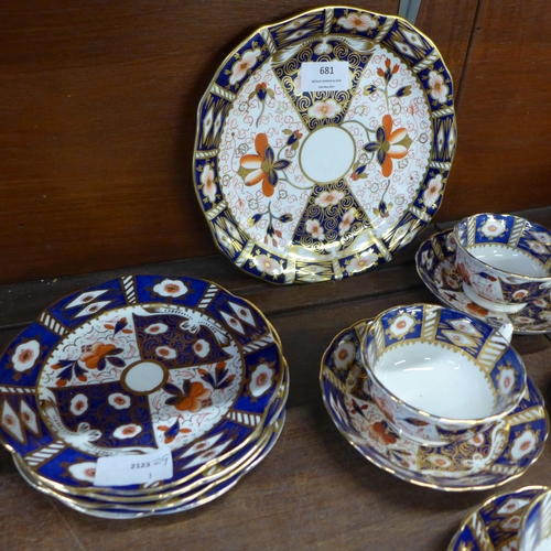 681 - Four Crown Derby trios and a Royal Crown Derby sandwich plate, (sandwich plate a/f)