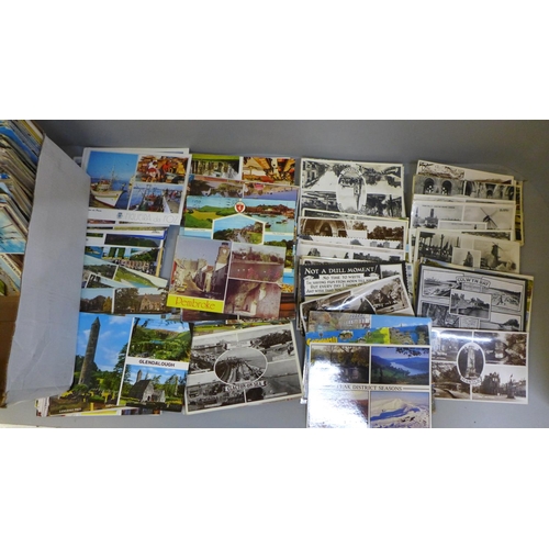 691 - Postcards: a quantity of multi-view postcards, vintage to modern