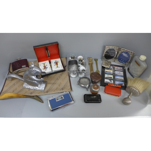 695 - Assorted items including a Squirrel shaped nutcracker, spirit flasks, Cunard matches, travel inkwell... 