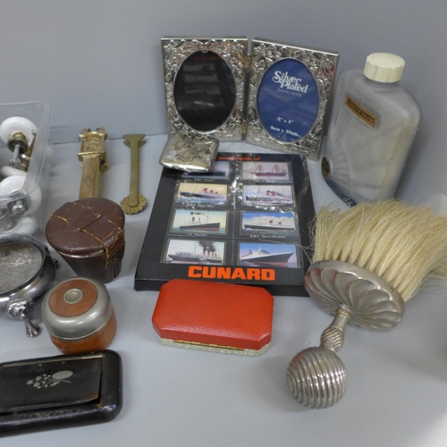 695 - Assorted items including a Squirrel shaped nutcracker, spirit flasks, Cunard matches, travel inkwell... 