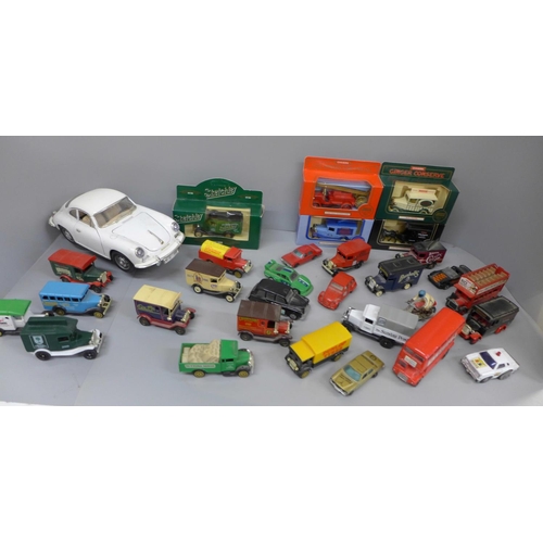 715 - A collection of die-cast model vehicles, mainly advertising vans and a Burago Porsche