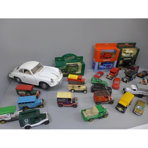 715 - A collection of die-cast model vehicles, mainly advertising vans and a Burago Porsche