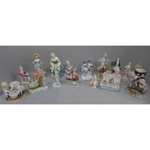 718 - Sixteen German and continental figures including spill holders and pin cushion doll, some a/f