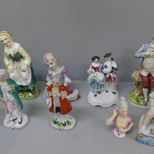 718 - Sixteen German and continental figures including spill holders and pin cushion doll, some a/f