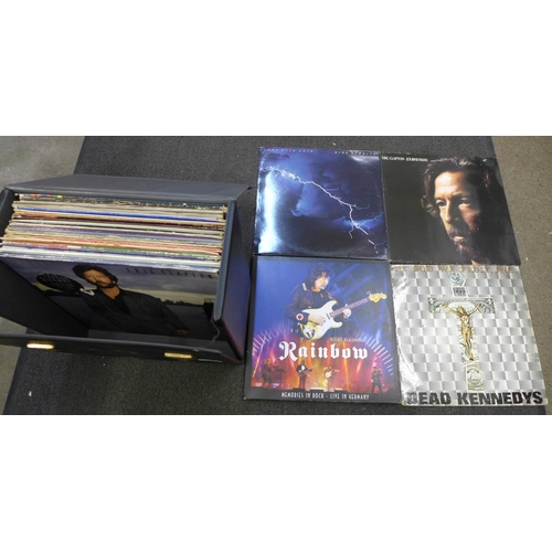 720 - Thirty-three vinyl LP records: rock, pop, soul, artists include Dead Kennedys, Eric Clapton, Bon Jov... 