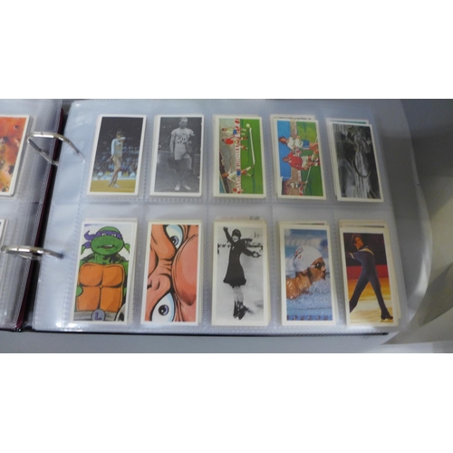 732 - Three albums of tea cards and cigarette cards