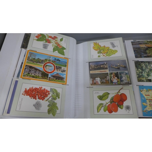 733 - Two postcard albums containing approximately 600 modern postcards