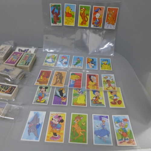 750 - A collection of cigarette cards and collector cards including John Player, Disney picture cards, etc... 