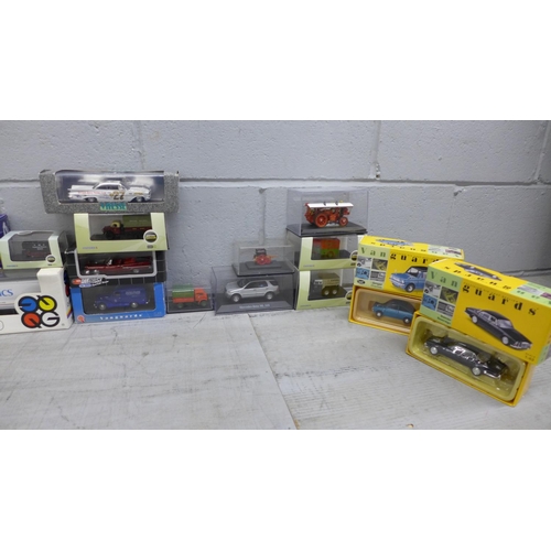 760 - A box of die-cast model vehicles, boxed, including Quadgraphics 1/64 scale Peterbilt 387