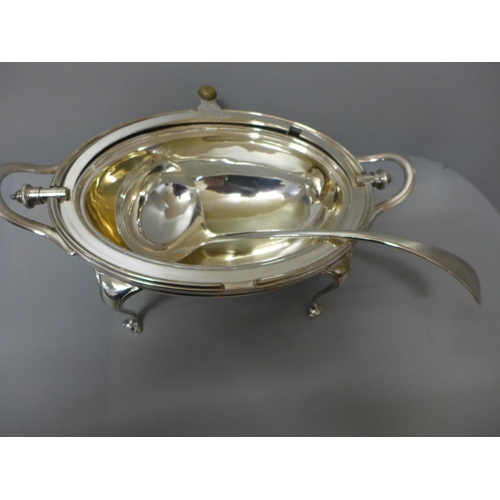 770 - A James Dixon & Son, Sheffield silver plated revolving top breakfast dish and ladle