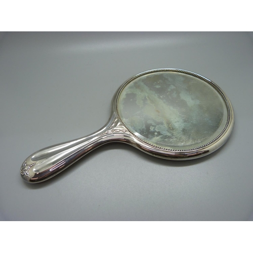 809 - A silver backed hand mirror, Birmingham 1910