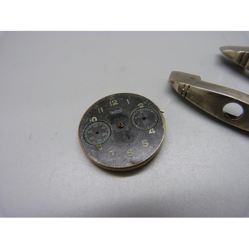 821 - A Hanhart Luftwaffe chronograph dial/part movement and two dagger cross guards