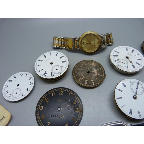 822 - A collection of pocket watch movements, etc.